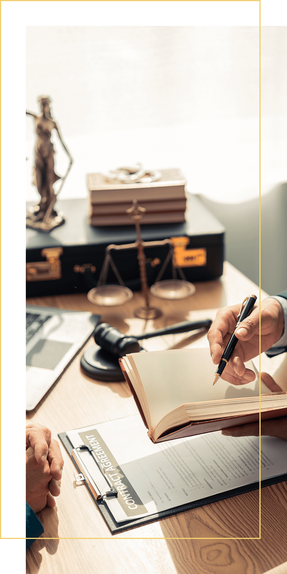 Justice symbols and paperwork on desk