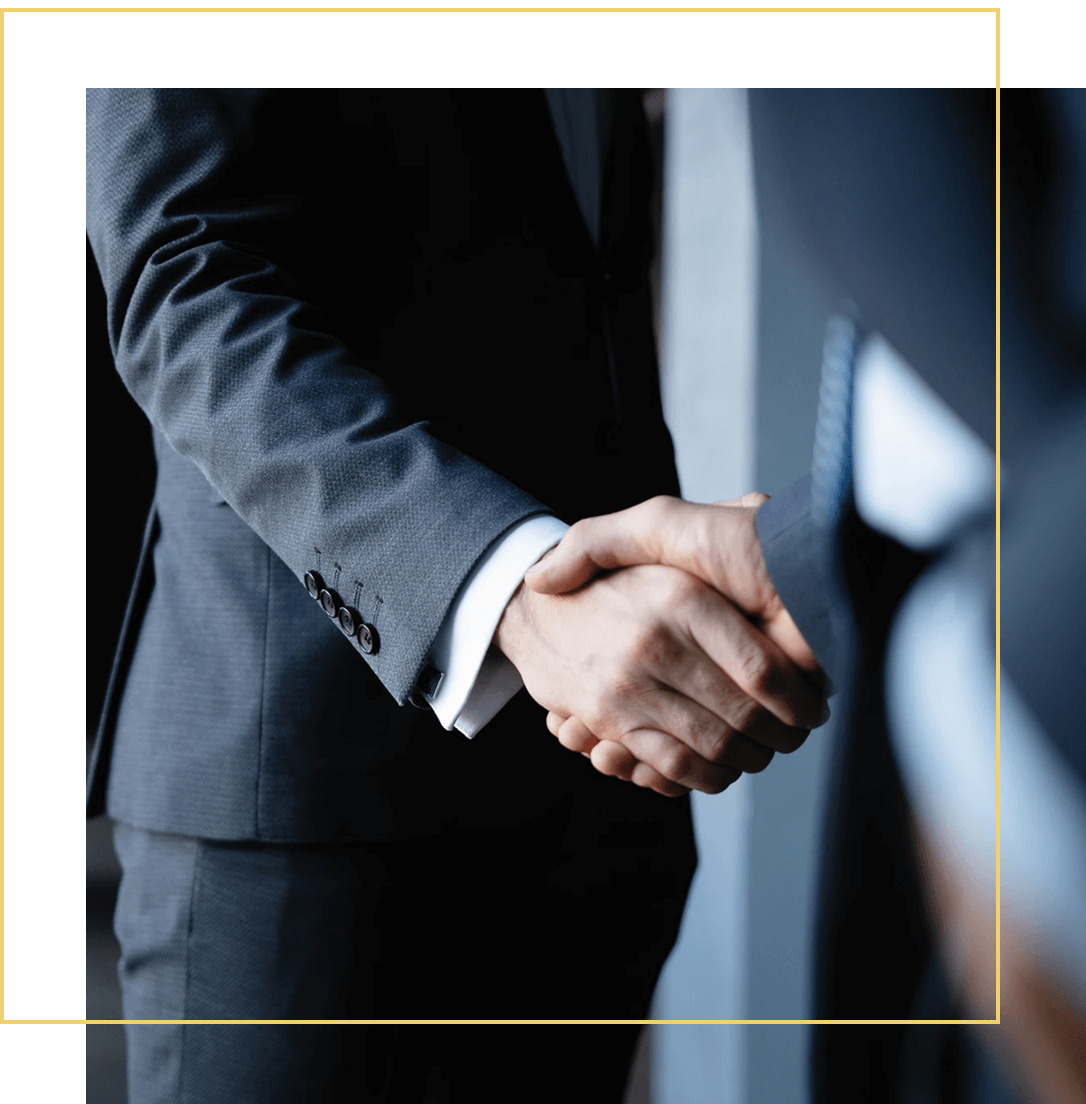 Close-up of two people shaking hands